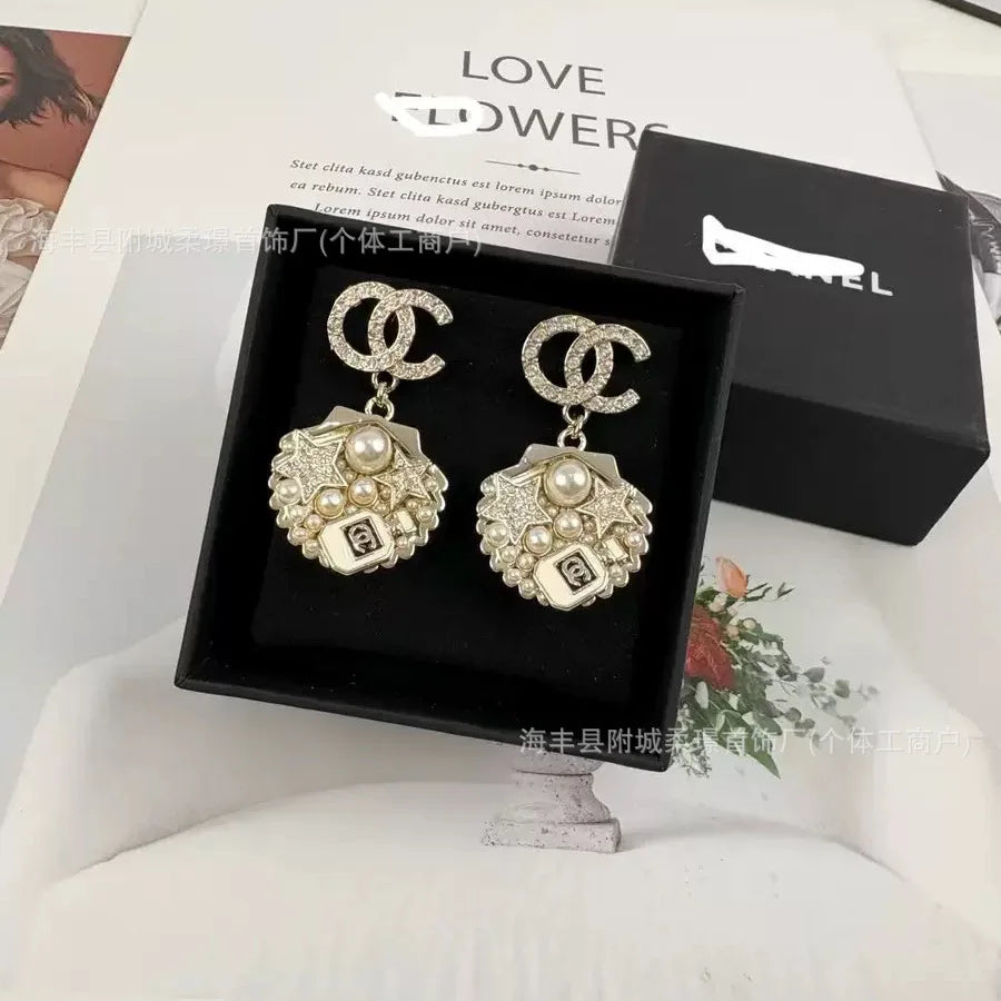 Small Sphere Shape Fashionable Round Ball with Square Diamond Letter Stud Earrings Gold-plated Material