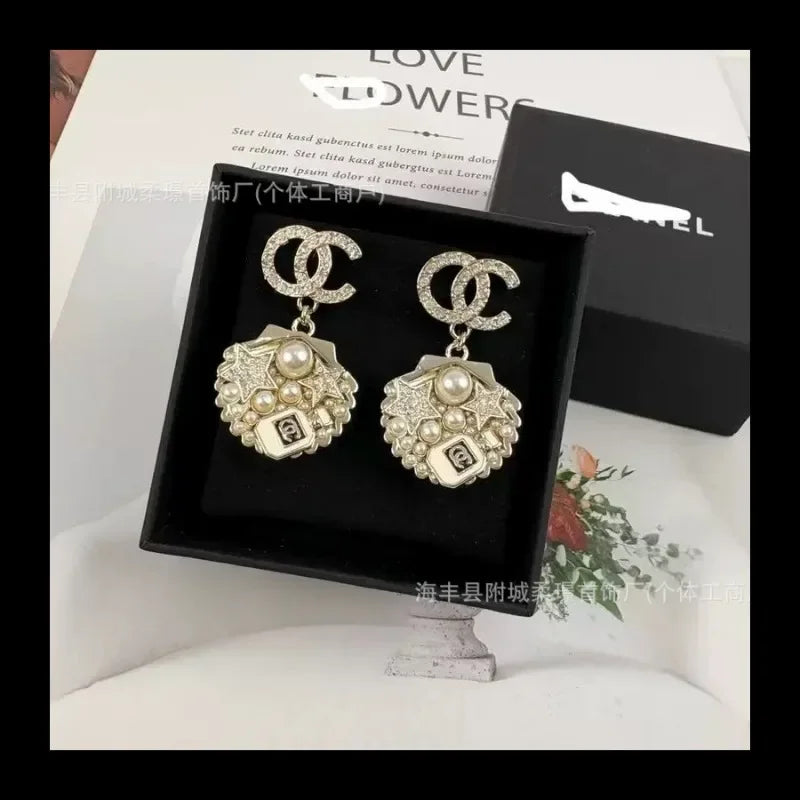 Small Sphere Shape Fashionable Round Ball with Square Diamond Letter Stud Earrings Gold-plated Material