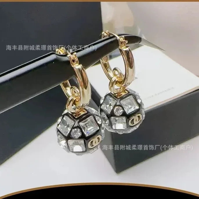 Small Sphere Shape Fashionable Round Ball with Square Diamond Letter Stud Earrings Gold-plated Material